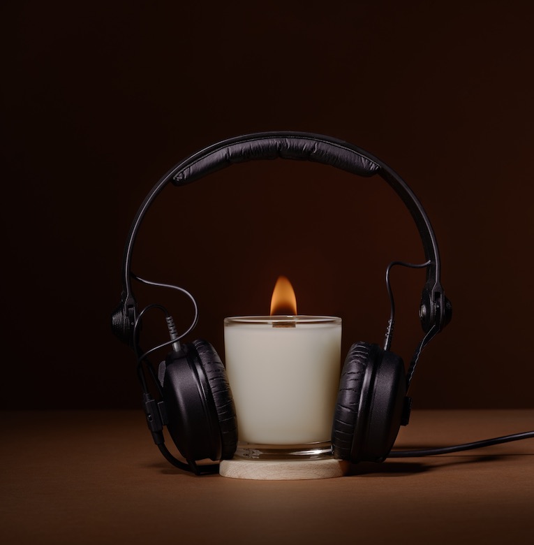 Photo headphones and candle