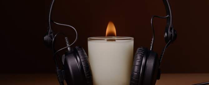 Photo headphones and candle